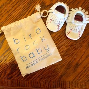 Baby moccasins with baseball design.